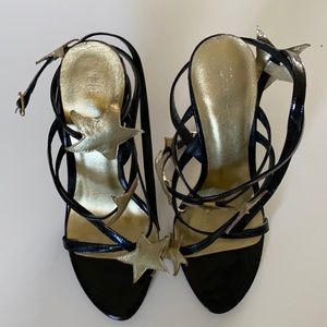 Strappy black and gold star heels